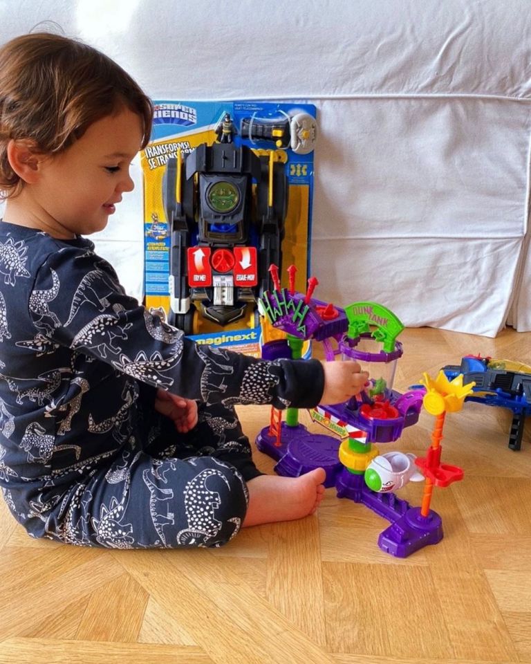 Paul plays with an item from Smyths Toys in one of his mum's Instagram adverts