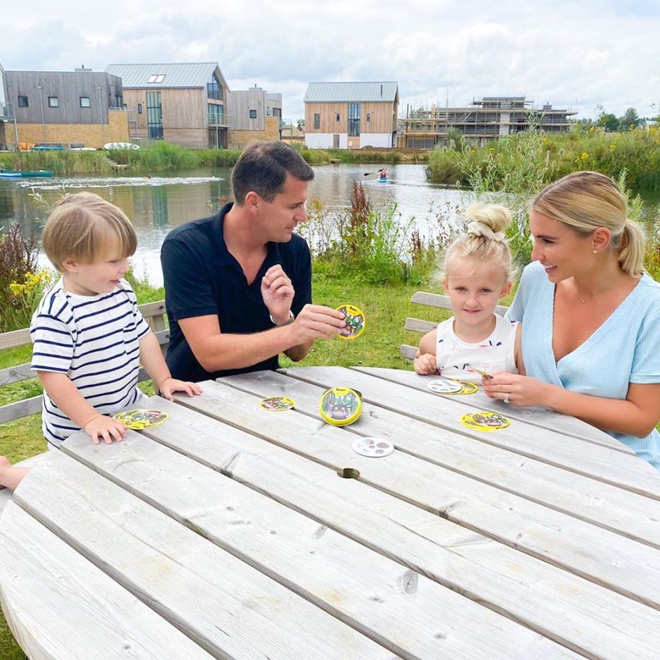 The family play a game outdoors in an Instagram ad for Asmodee UK