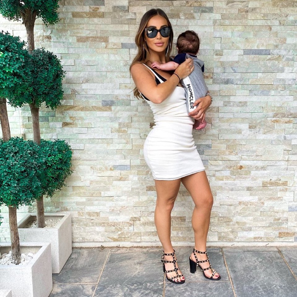 Lauryn poses with her little one, while giving a shout-out to Base childrenswear