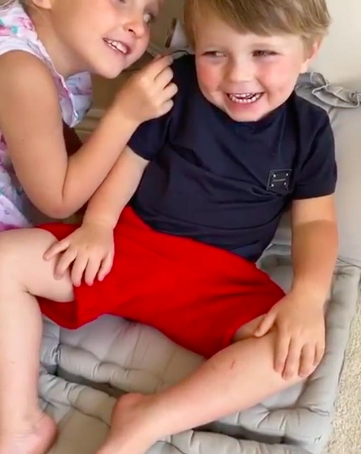 Nelly plays with her brother in a social media advert for creative kits