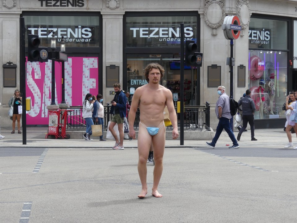 Can this man walking on Oxford Street make his point about face masks in my town?