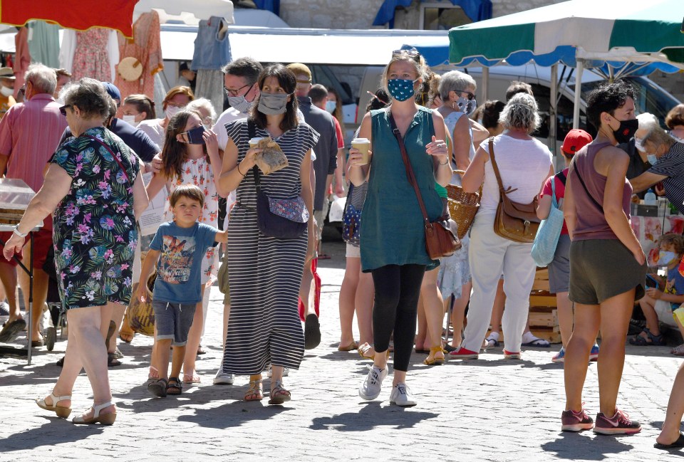 Brit tourists enjoy the sun in France - as the country warns progress in the fight against coronavirus has been 'erased'