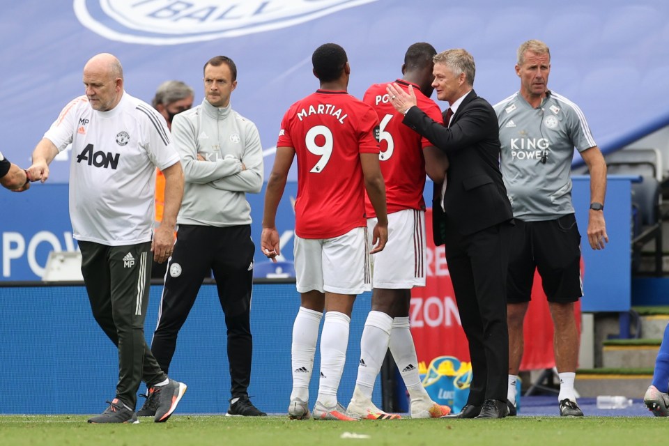 Solskjaer celebrates with Paul Pogba at the full-time whistle