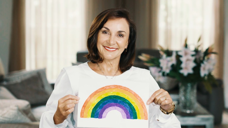 Shirley Ballas holds up a rainbow painting