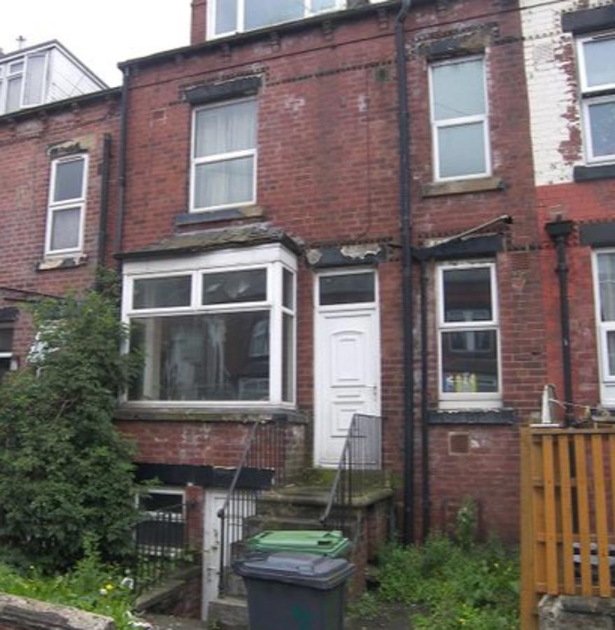 This three-storey home in Leeds has gone on the market - but the new buyer will need a strong stomach and plenty of bin bags