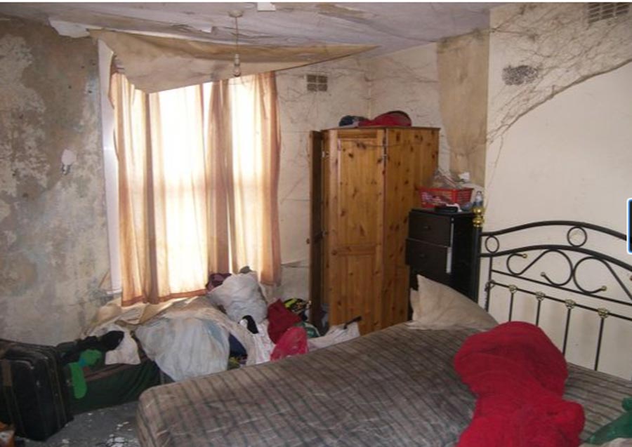 The home is in dire need of TLC, with one of its two bedrooms covered with thick spider webs 