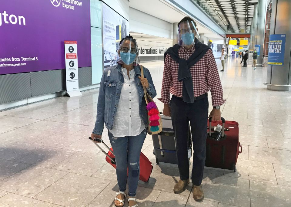 Tony and Yolanda Schofield, from Leamington Spa, arriving back at Heathrow Airport in London from Madrid