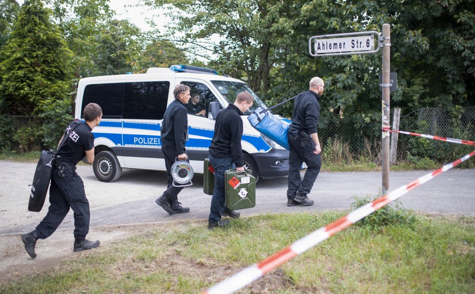 Police officers arrive to renew their search of the site 