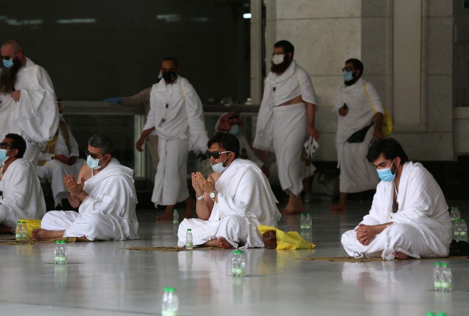 Men dress in white garments meant to emphasise the equality of all Muslims