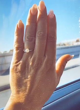 The star flashed a diamond ring on her wedding finger