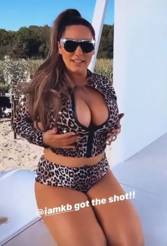 Kelly Brook flashed her cleavage in a daring set of shots 