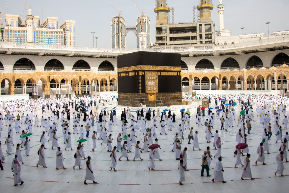 Pilgrims wearing face masks and keeping social distanc during the annual hajj pilgrimage 