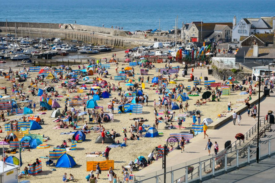 Holidaymakers and staycationers flock to the seaside in Dorset