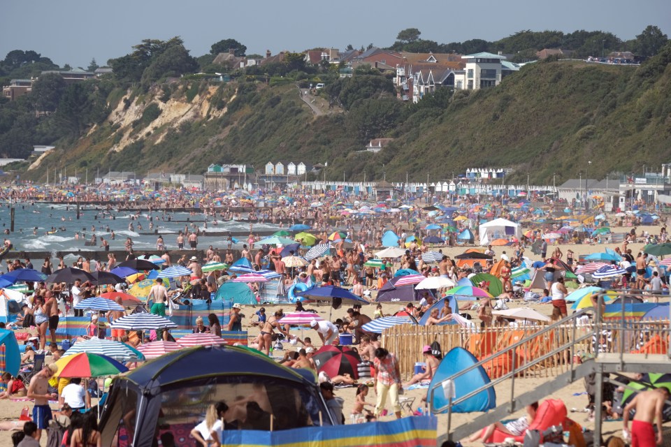 Bournemouth beach is packed out on the hottest day of the year