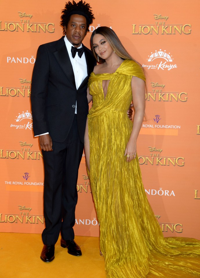 Both Beyoncé and husband Jay Z, pictured at The Lion King film premiere last year, have been accused of being members of the top-secret group