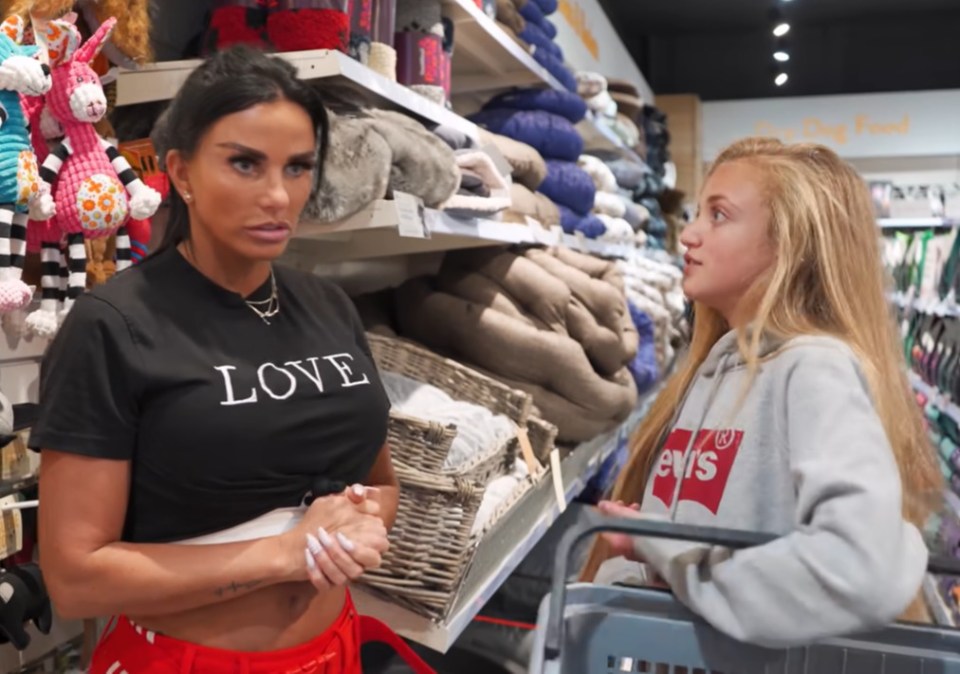 Katie and Princess at a pet shop picking up supplies for Rolo