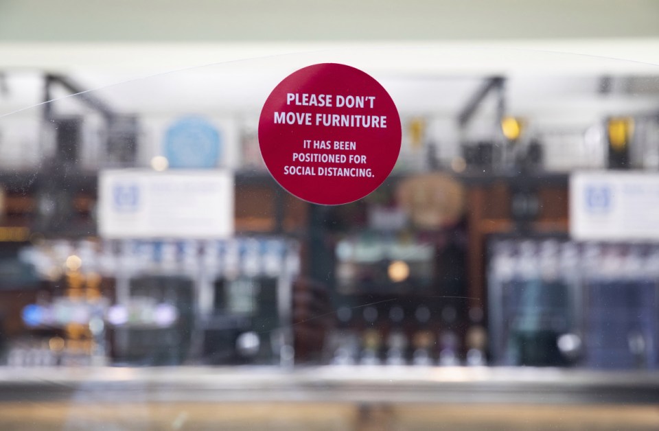 Social distancing signs had been put up around Wetherspoons pubs to make sure people keep apart