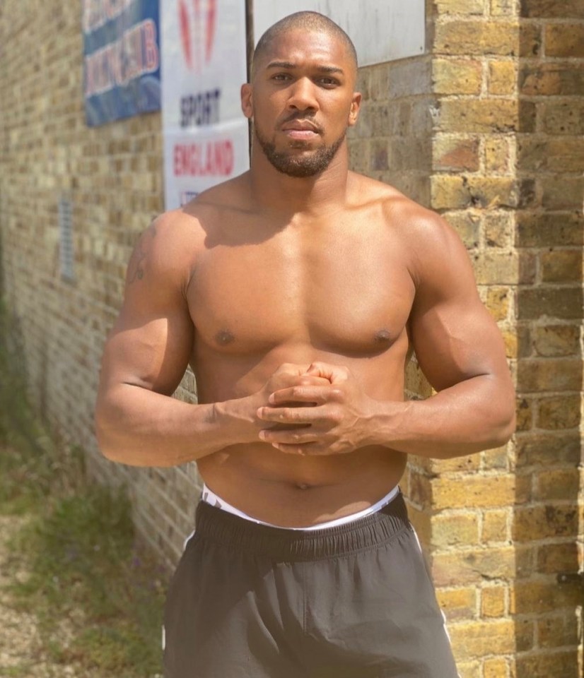 Joshua looked hard as nails as he showed off his new shaven look and bulked up physique