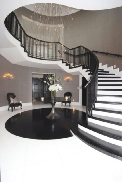 This stunning staircase will greet the new owner