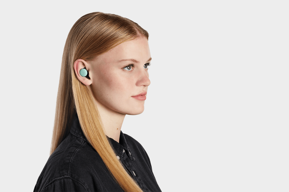 The earbuds are designed to sit near-flush with your ear