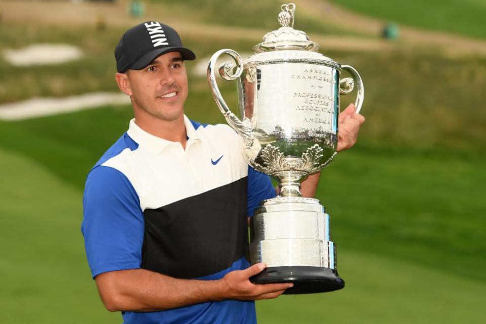  Brooks Koepka with the Wanamaker Trophy after winning the 2019 PGA