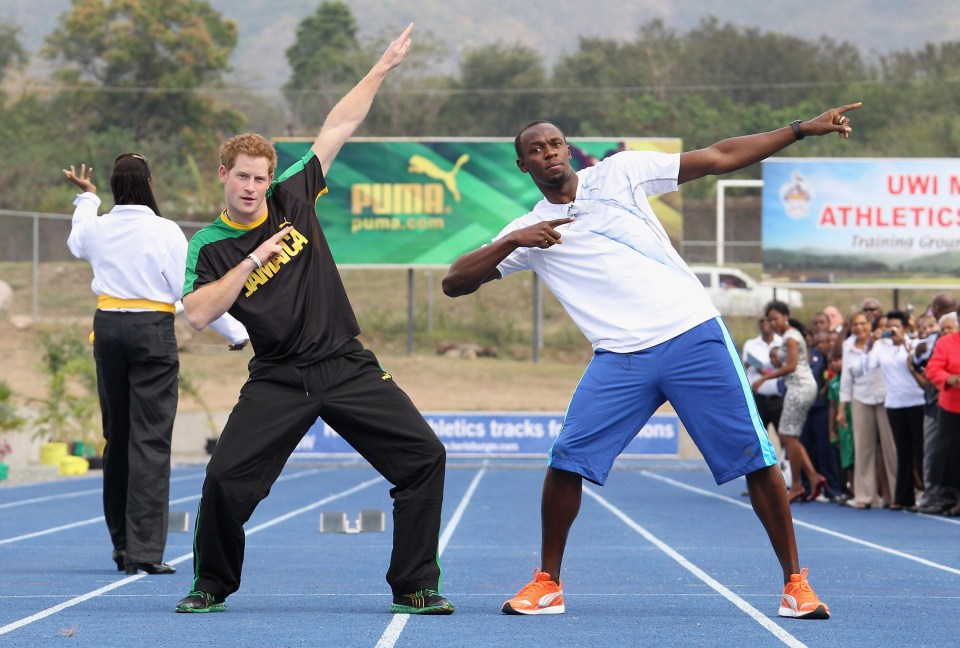 Prince Harry poses with Usain Bolt in Jamaica as part of a Diamond Jubilee Tour