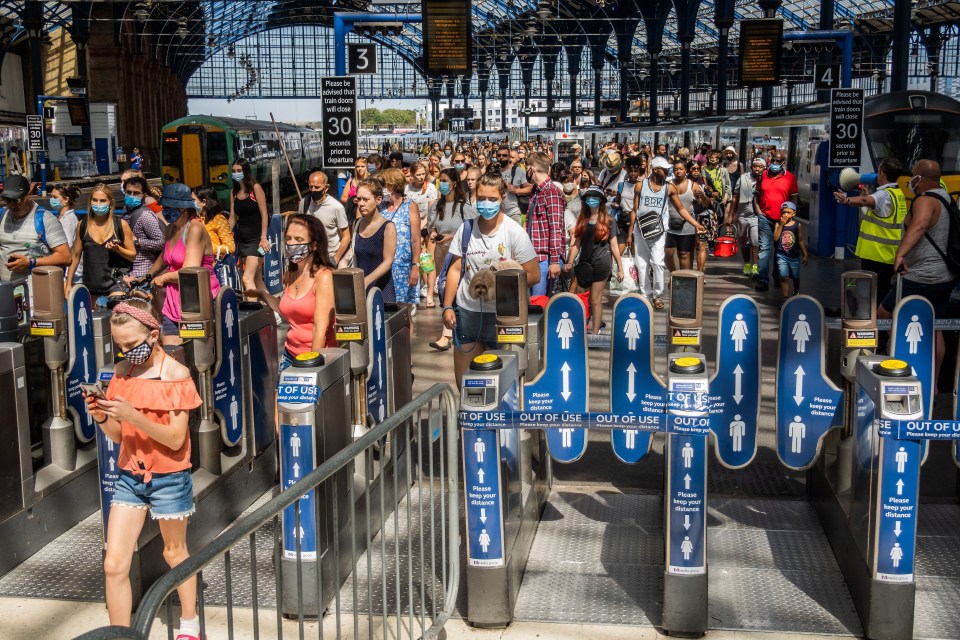 Sun-worshippers in masks arrived in Brighton to enjoy the heatwave this morning