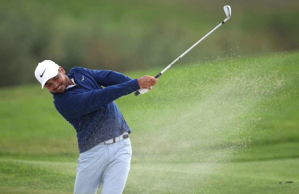 Jason Day lays out of a bunker on the 18th at the USPGA in San Francisco