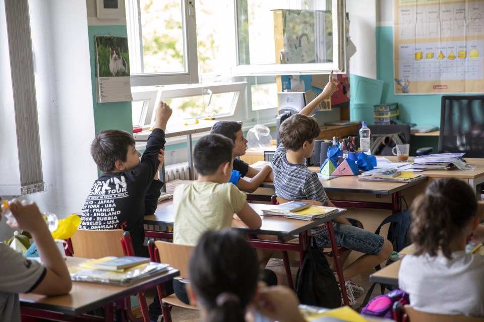 Children are back in school for the first time in Berlin today and are required to wear masks in the hallways, but not in class or the playground