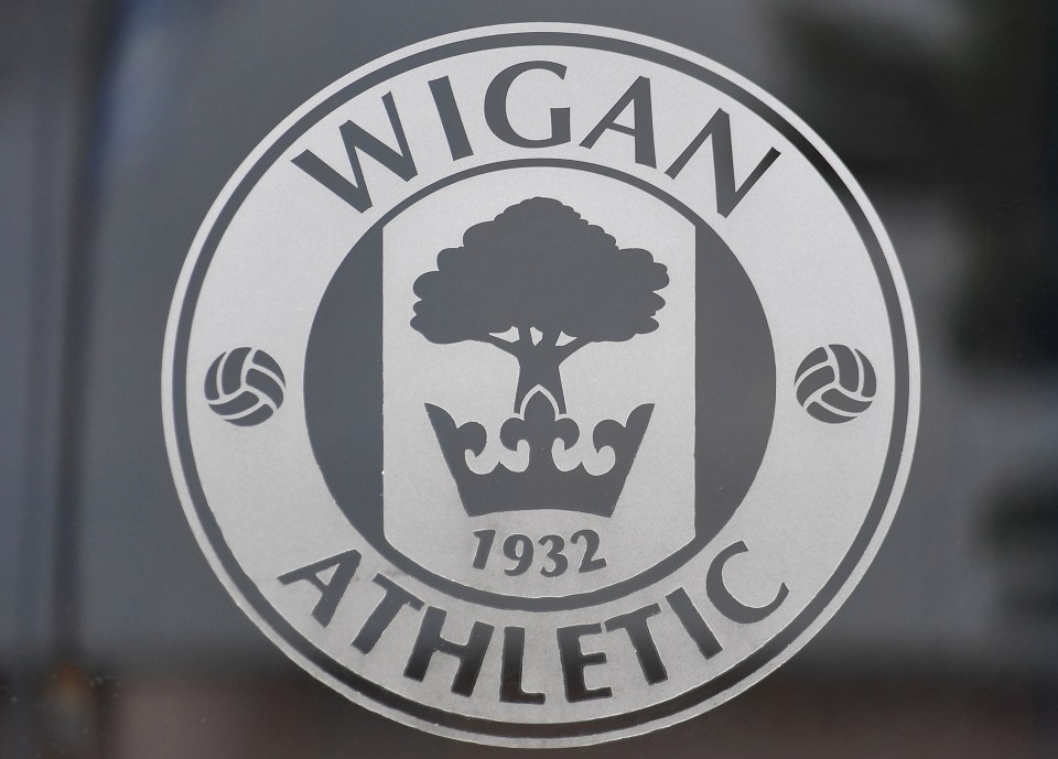 Wigan relegated to League One after having 12 points deducted for going into administration