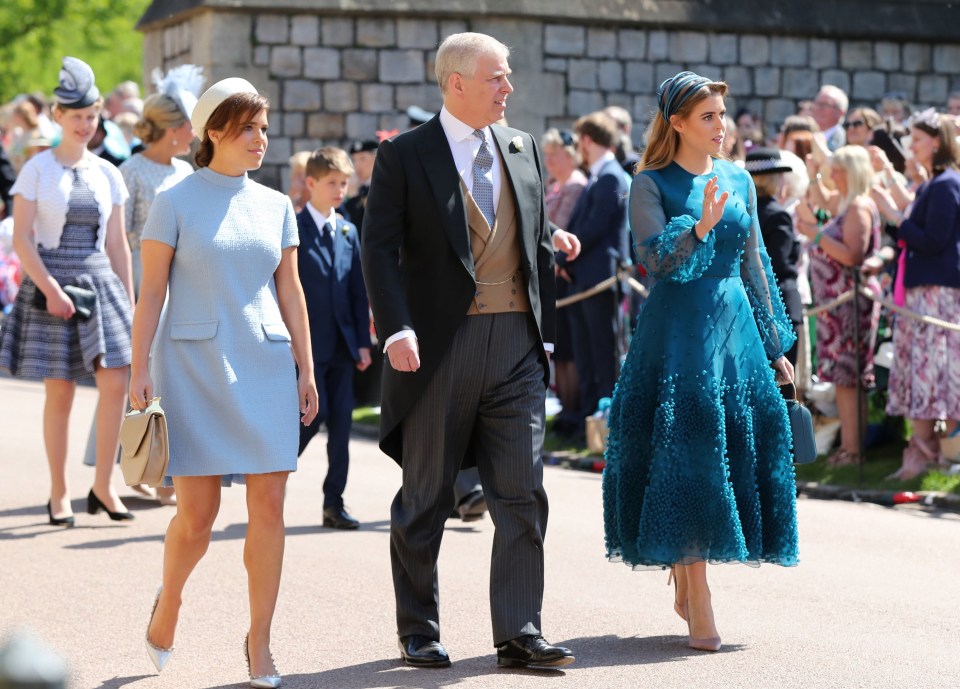 Princess Eugenie, Prince Andrew, Duke of York and Princess Beatrice arrive at St George’s Chapel at Windsor Castle before the wedding of Prince Harry to Meghan Markle