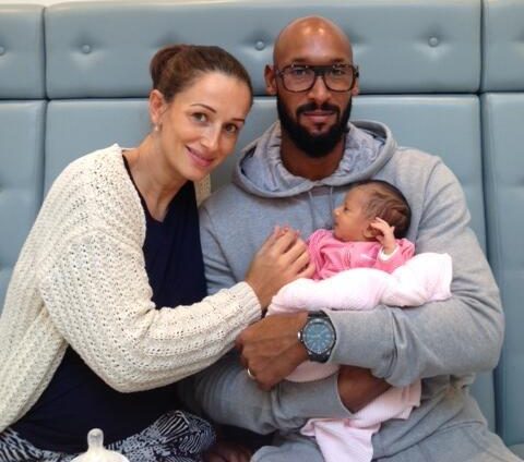  Anelka with his wife and child back in 2014