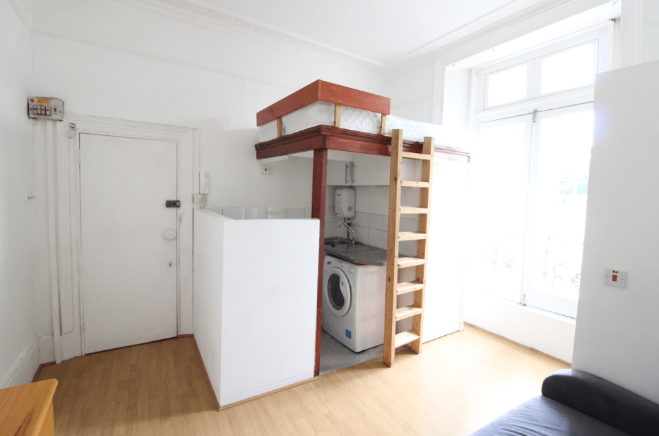 A studio flat which features a washing machine, kitchenette and TOILET under the bed has gone on the market. Image: Zoopla