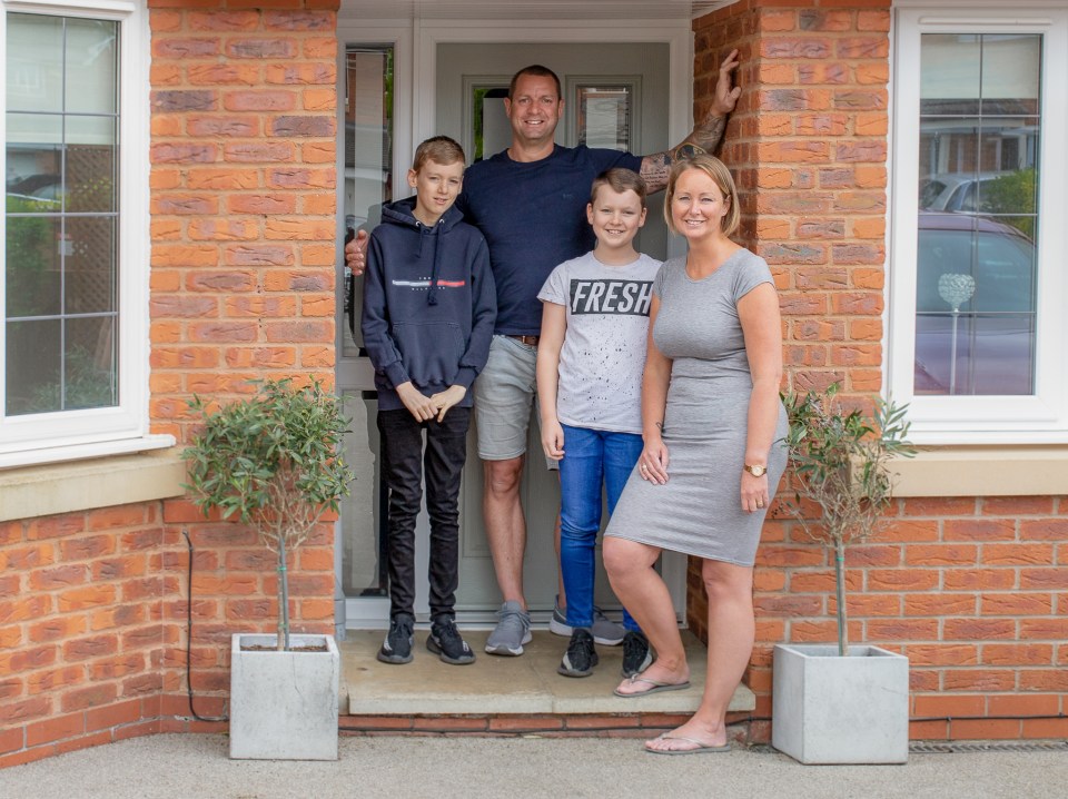 Self-confessed 'lazy' parents Kerry and Kevin Davies with sons Gabriel, 13, left, and Zachary, nine, second right