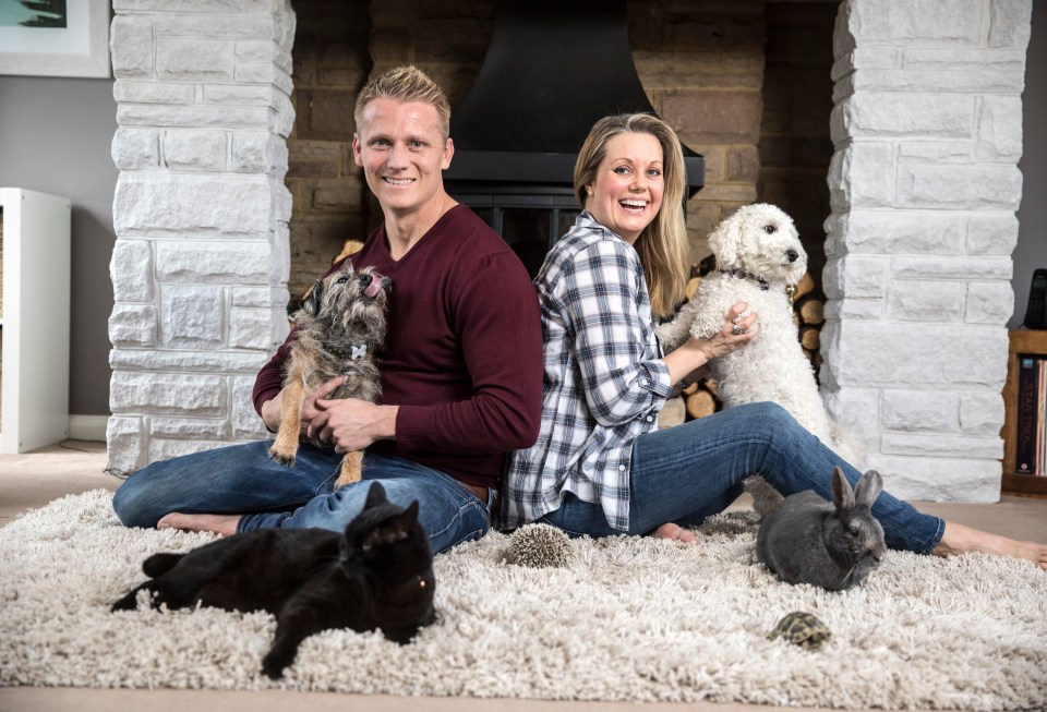 Dr Scott Miller with his wife Zoe Christien at home with their pets