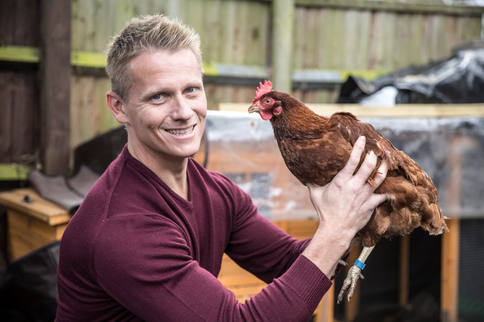 Dr Scott Miller with one of his chickens