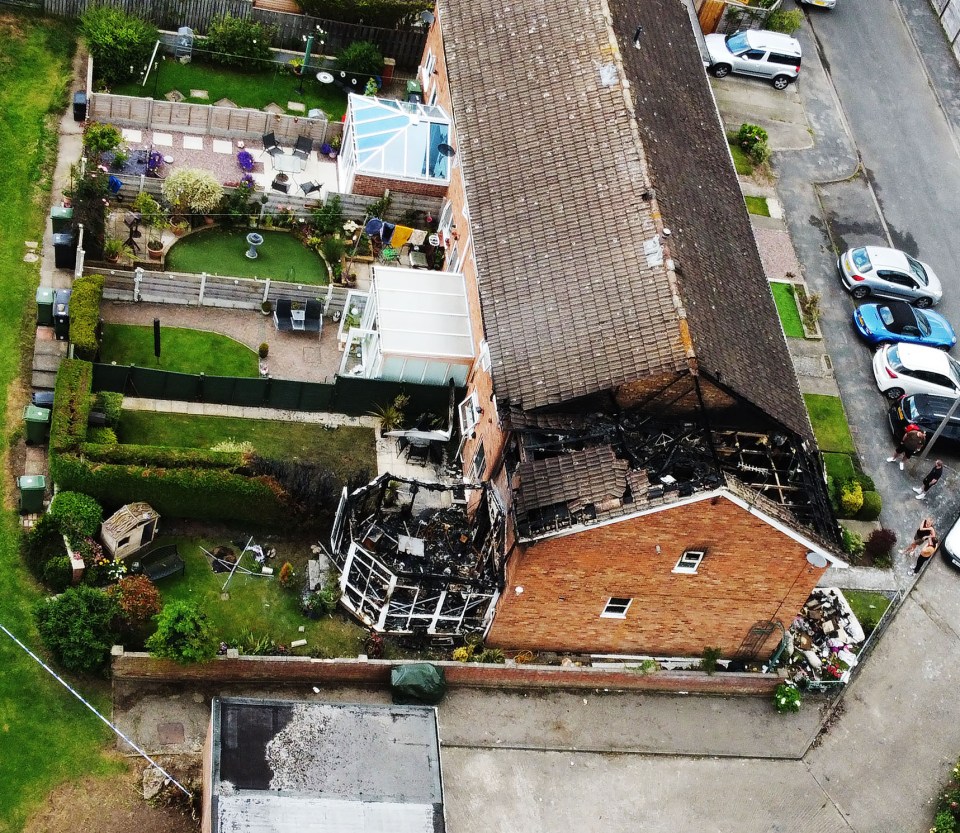 A birds-eye view shows the damage to the house