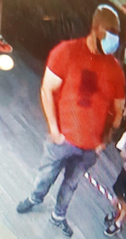 The assailant was caught on CCTV wearing jeans and a red t-shirt