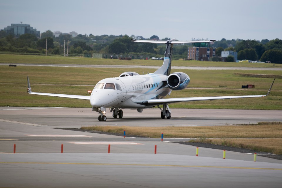 A plane is seen at the RAF base as the Queen and Prince Philip fly for Balmoral