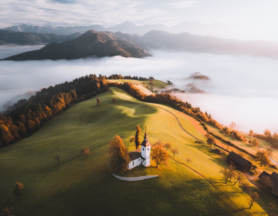 A stunning aerial shot from above the clouds in Slovenia