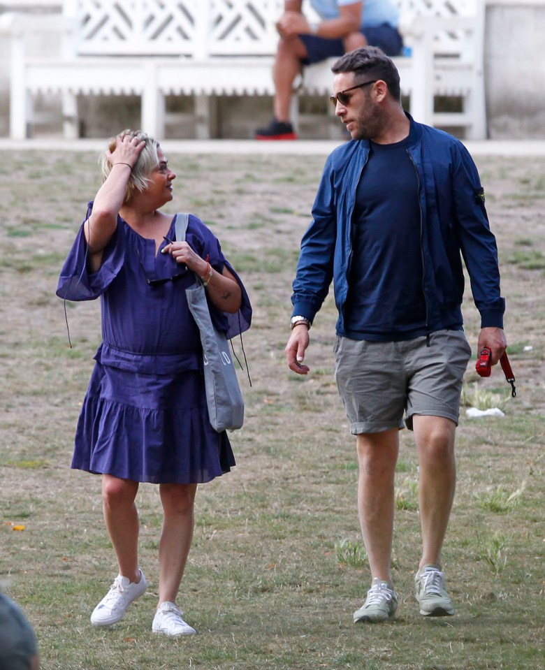 The couple were photographed together at a park in West London