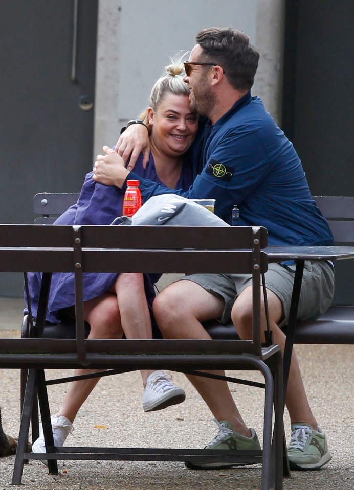 Lisa Armstrong beams with happiness while wrapped in the arms of her new love James Green