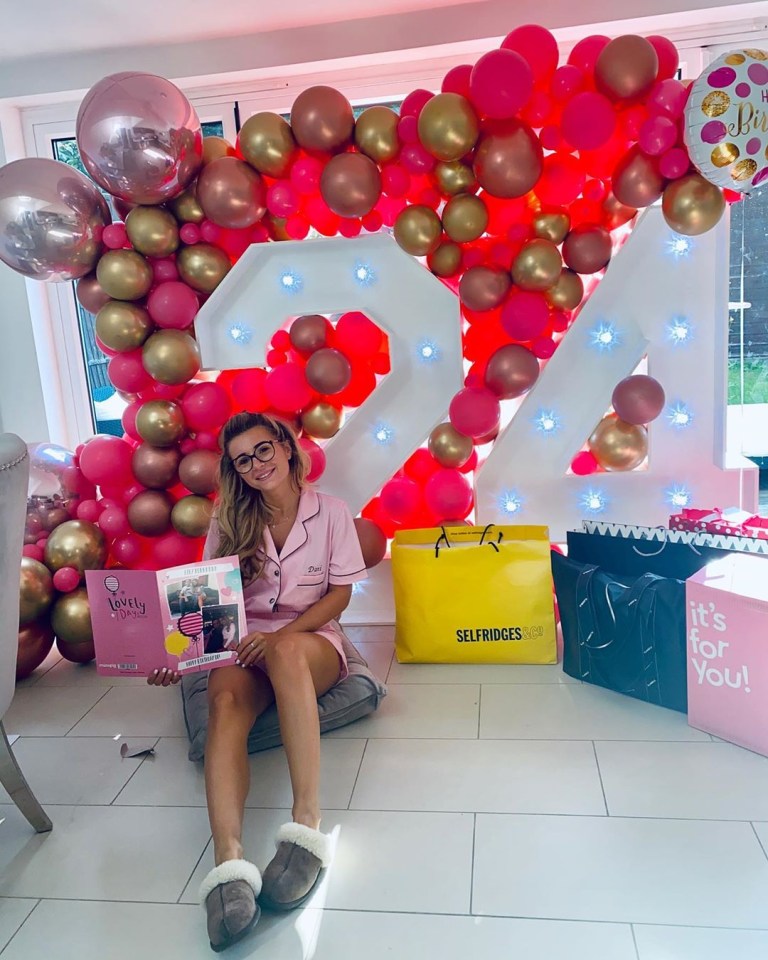 The Love Island champ was treated to a giant wall of balloons and lots of presents