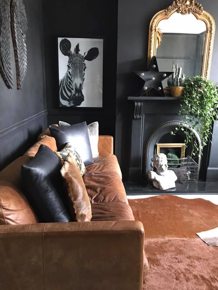 This gold mirror cost £40 from Facebook Marketplace, while the genuine skin rug was £40