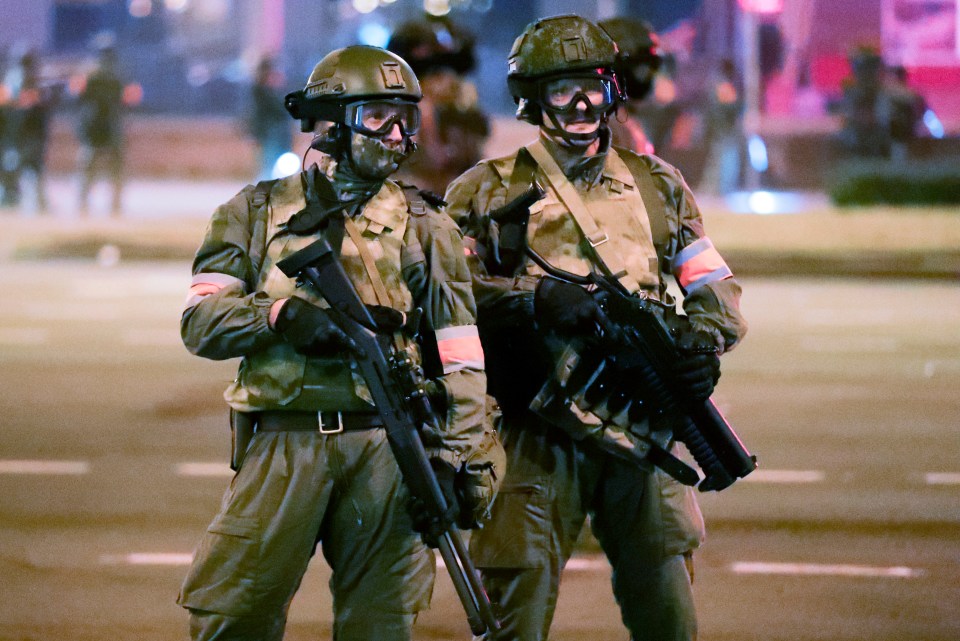 Armed cops in military fatigues were out in force last night