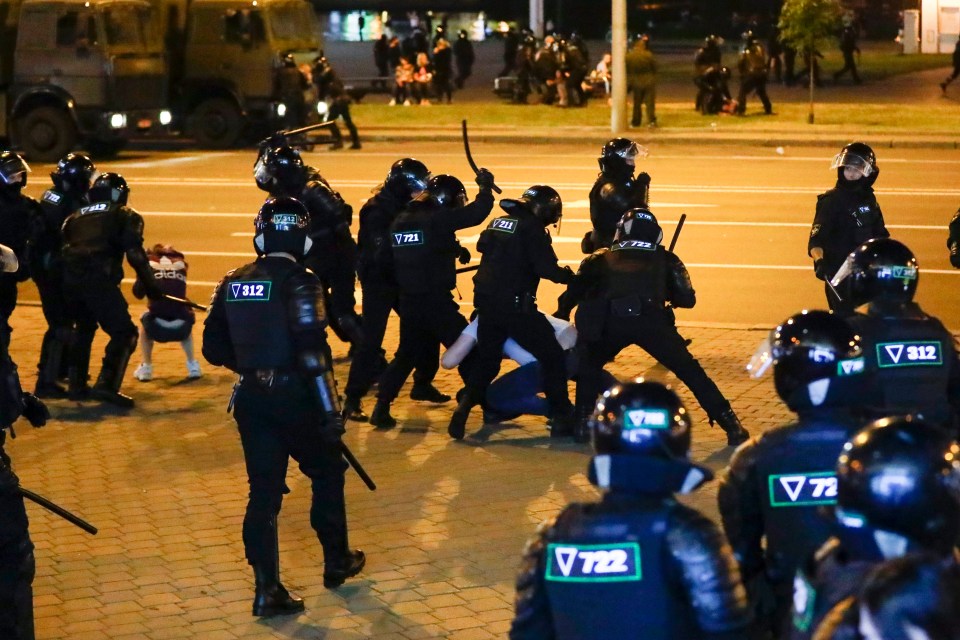 Riot police beat demonstrators calling for Lukashenko to step down