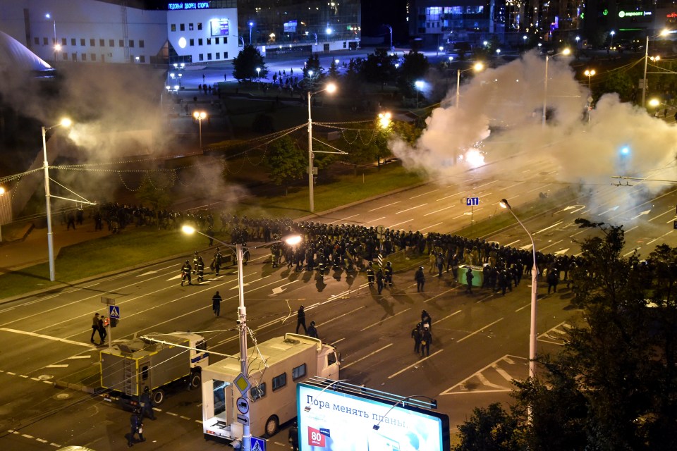 Riot cops block off a square during demonstrations last night