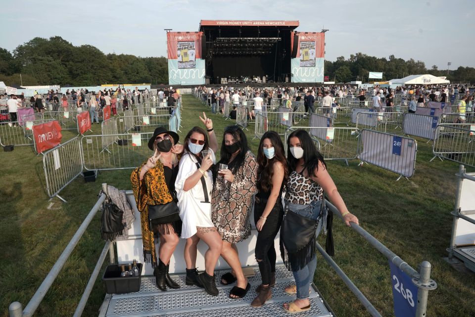 Fans wore face masks as they walked around the site