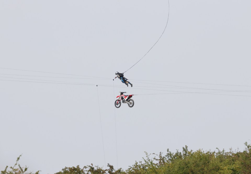 The motorcycle exploded in a disused quarry after leaping from a huge specially constructed ramp