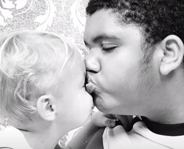 Mum Katie shared a sweet photo of her eldest son Harvey kissing her youngest son, Jett